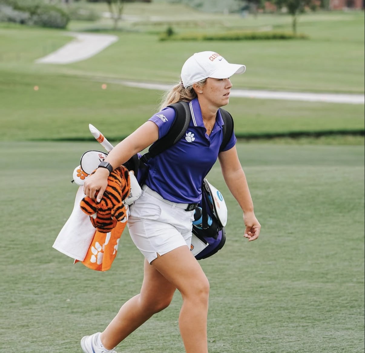 Chloe Holder walking the fairway during a college tournament